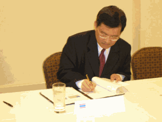 AFTC Secretary-General Chaipat Sahasakul Signs the CFTC-Thailand Arrangement, March 16, 2006, Boca Raton, Florida