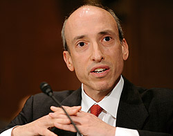 Photo showing U.S. Commodity Futures Trading Commission Chairman Gary Gensler testifying on Capitol Hill in Washington, Monday, June 22, 2009, before the Senate Banking Committee hearing on over-the-counter derivatives.