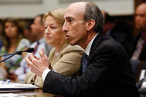 Photo showing Gary Gensler (R), chairman of the Commodity Futures Trading Commission, and Mary Schapiro (L), chairman of the Securities and Exchange Commission, testifying before the House Financial Services Committee.