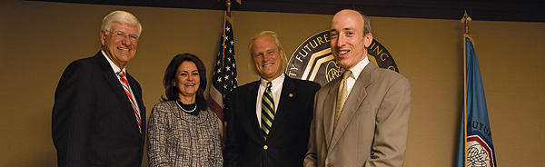 Photo showing the fiscal year 2009 Commissioners. From left to right are: Michael V. Dunn, Jill E. Sommers , Bart Chilton, and Gary Gensler.