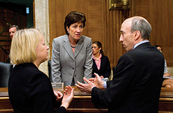 Photo showing Senator Susan Collins, R-Maine, the ranking Republican of the Senate Financial Services and General Government subcommittee, center, talking with Securities and Exchange Commission (SEC) Chair Mary Schapiro, left, and Commodities Futures Trading Commission (CFTC) Chairman Gary Gensler, on Capitol Hill in Washington, Wednesday, April 28, 2010, prior to the start of the subcommittee’s hearing on proposed fiscal 2011 appropriations for the CFTC and for the SEC.