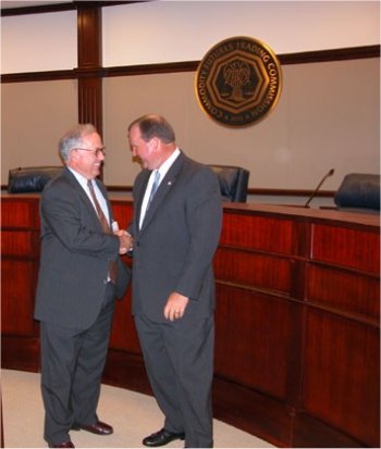 National Futures Association (NFA) President and Chief Executive Officer Daniel J. Roth (on the left) and Commodity Futures Trading Commission (CFTC) Chairman James E. Newsome Before the Joint Press Briefing Session Held August 26, 2003, at the CFTC's Washington, D.C., Headquarters.